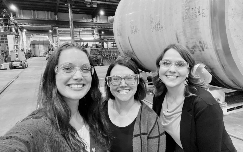 Three girls are wearing glasses and are smiling in Central Minnesota