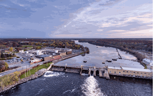 A scenic view of a lake and a dam